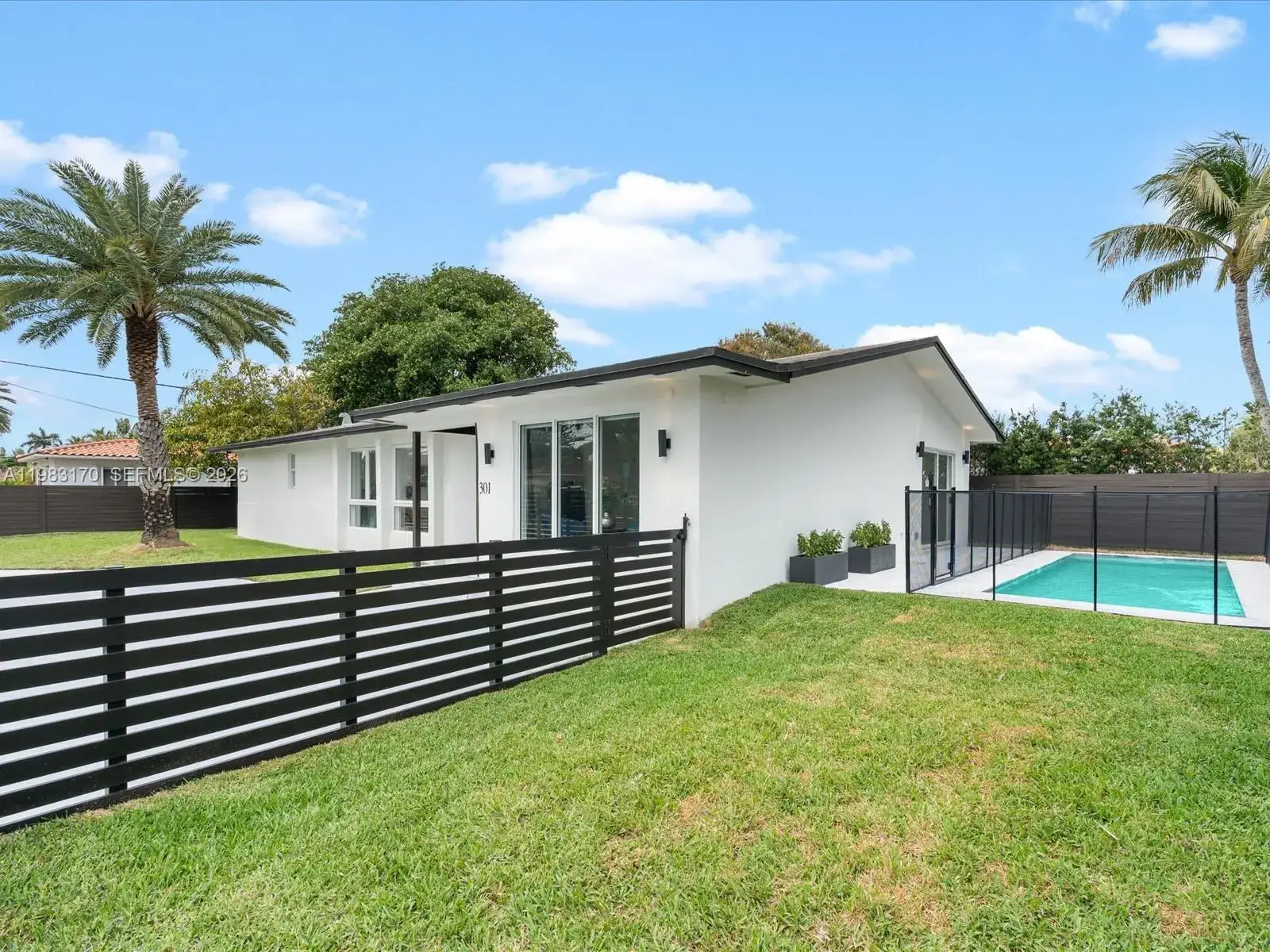 4 bedroom 3 bath Residential for sale at 301 88th St, Surfside FL 33154