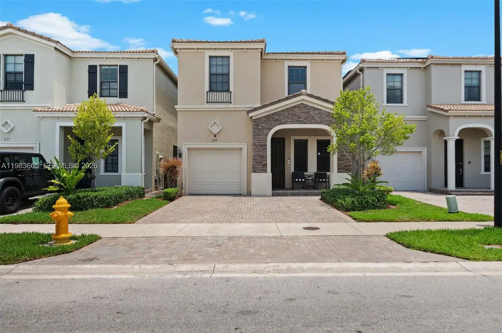 4 bedroom 2 bath Residential for sale at 659 NE 191st St, Miami FL 33179