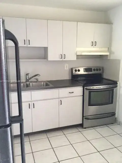 2 bedroom 2 bath Residential for sale at 1855 W 60th St # 423C, Hialeah FL 33012
