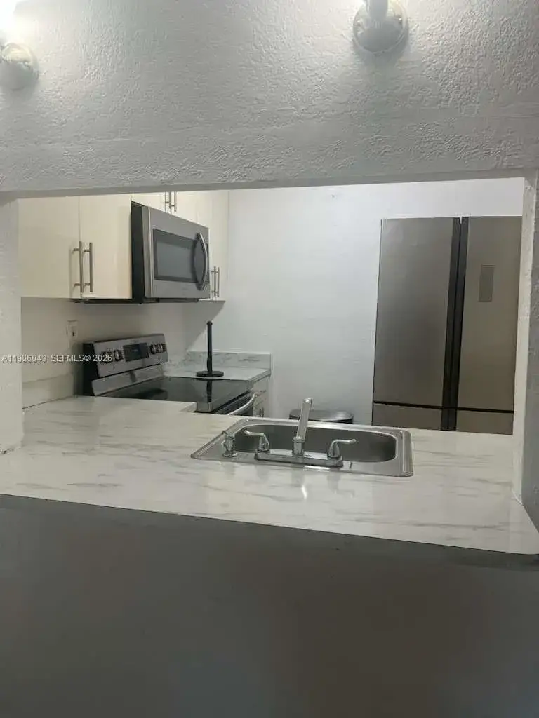 1 bedroom 1 bath Residential for sale at 4550 NW 9th St # 114E, Miami FL 33126
