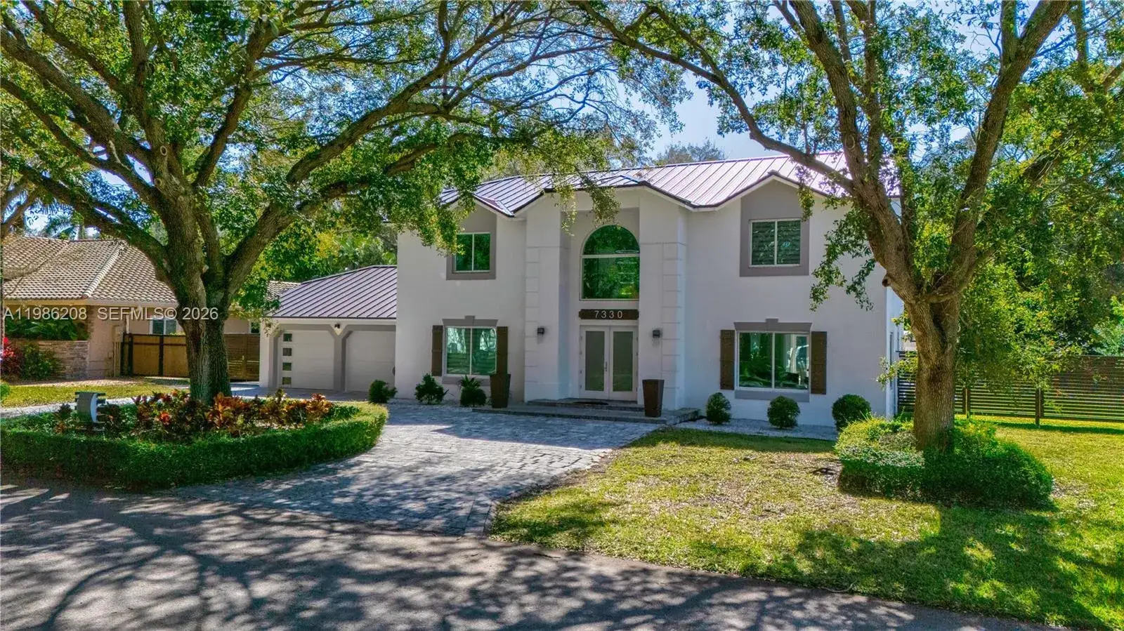 4 bedroom 4 bath Residential for sale at 7330 SW 165th St, Palmetto Bay FL 33157