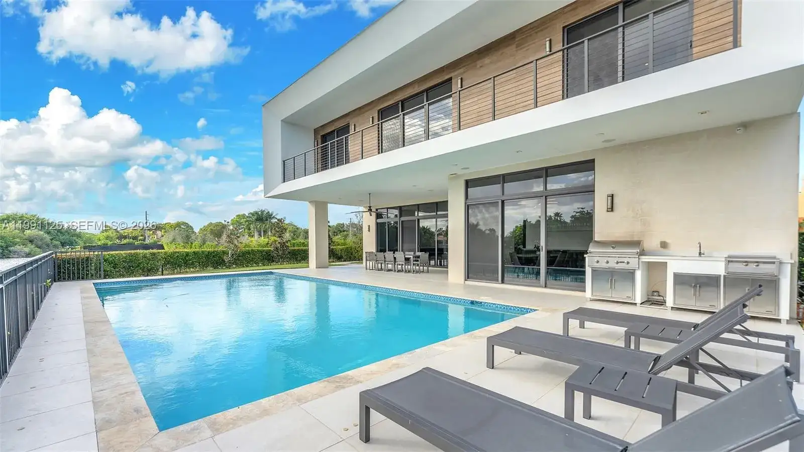 5 bedroom 6 bath Residential for sale at 16772 Botaniko Dr S, Weston FL 33326