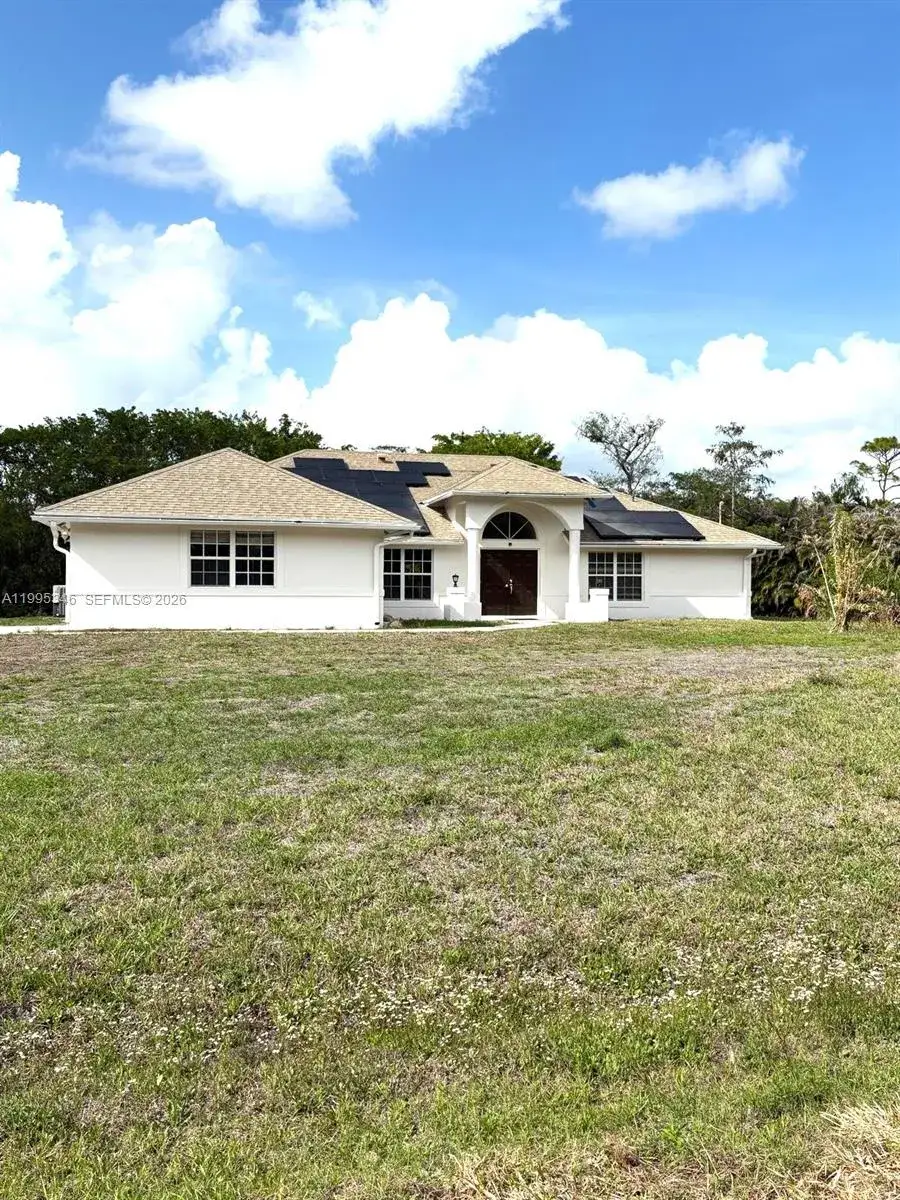 5 bedroom 3 bath Residential for sale at 16613 N 61st Pl N, Westlake FL 33470