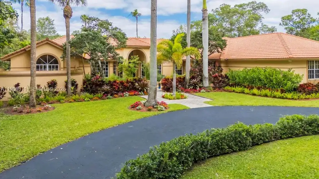 6 bedroom 5 bath Residential for sale at 5328 E Leitner Dr, Coral Springs FL 33067