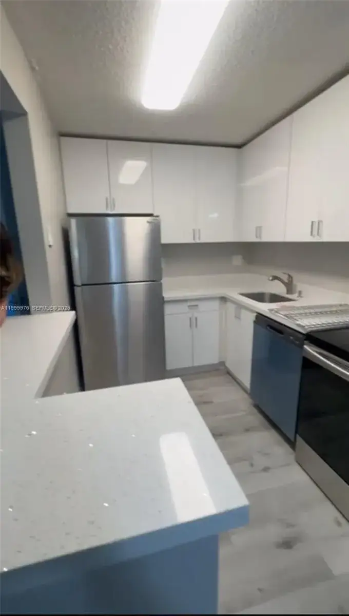 1 bedroom 1 bath Residential for sale at 7100 NW 179th St # 102, Hialeah FL 33015