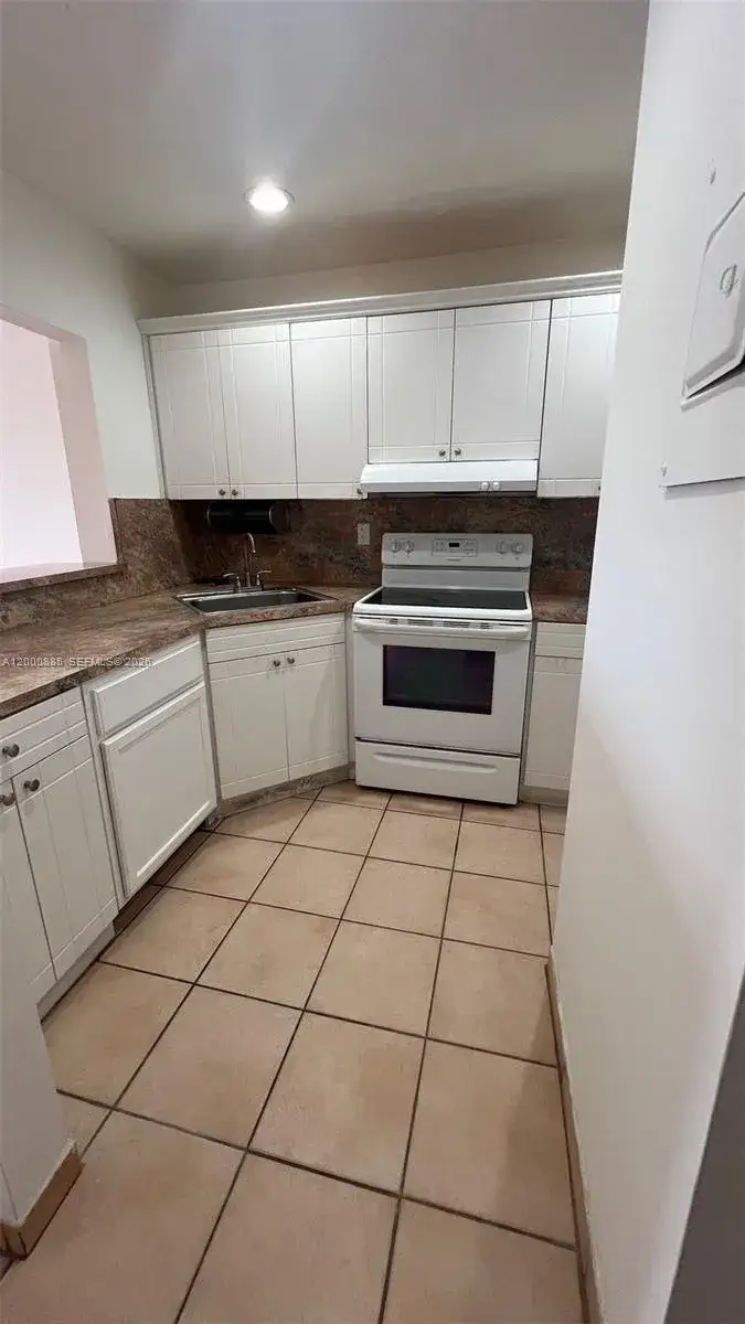 2 bedroom 1 bath Residential for sale at 6070 W 18th Ave # 323, Hialeah FL 33012