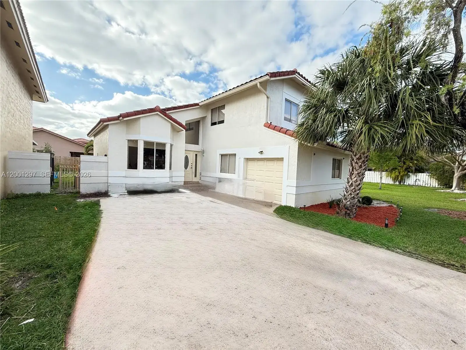 4 bedroom 3 bath Residential for sale at 18318 NW 61st Ct, Hialeah FL 33015