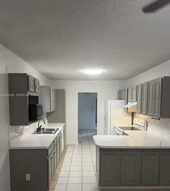 4 bedroom 2 bath Residential Lease for rent at 19920 SW 118th Pl # 0, Miami FL 33177