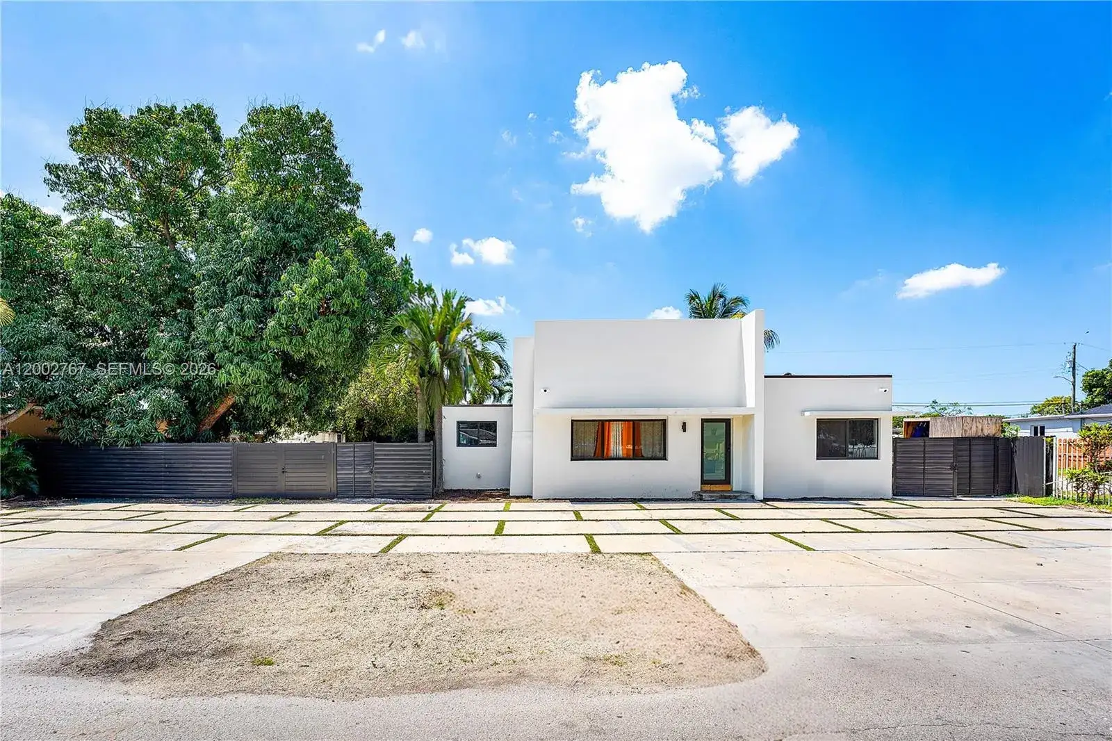 9 bedroom 6 bath Residential for sale at 3040 NW 93rd St, Miami FL 33147