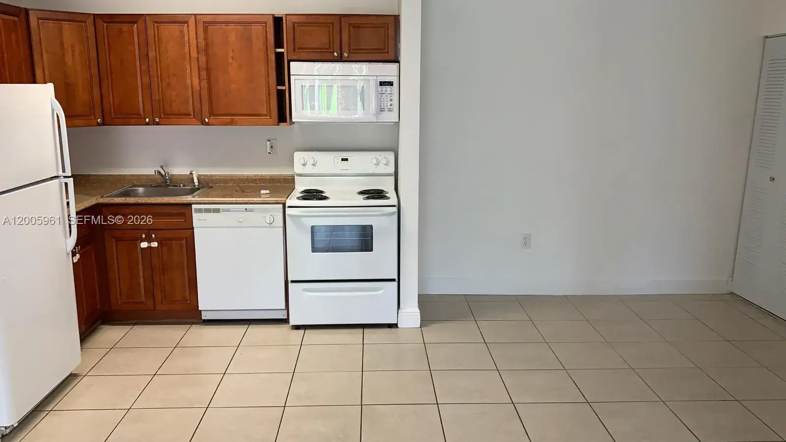 2 bedroom 2 bath Residential for sale at 7090 NW 179th St # 108, Hialeah FL 33015