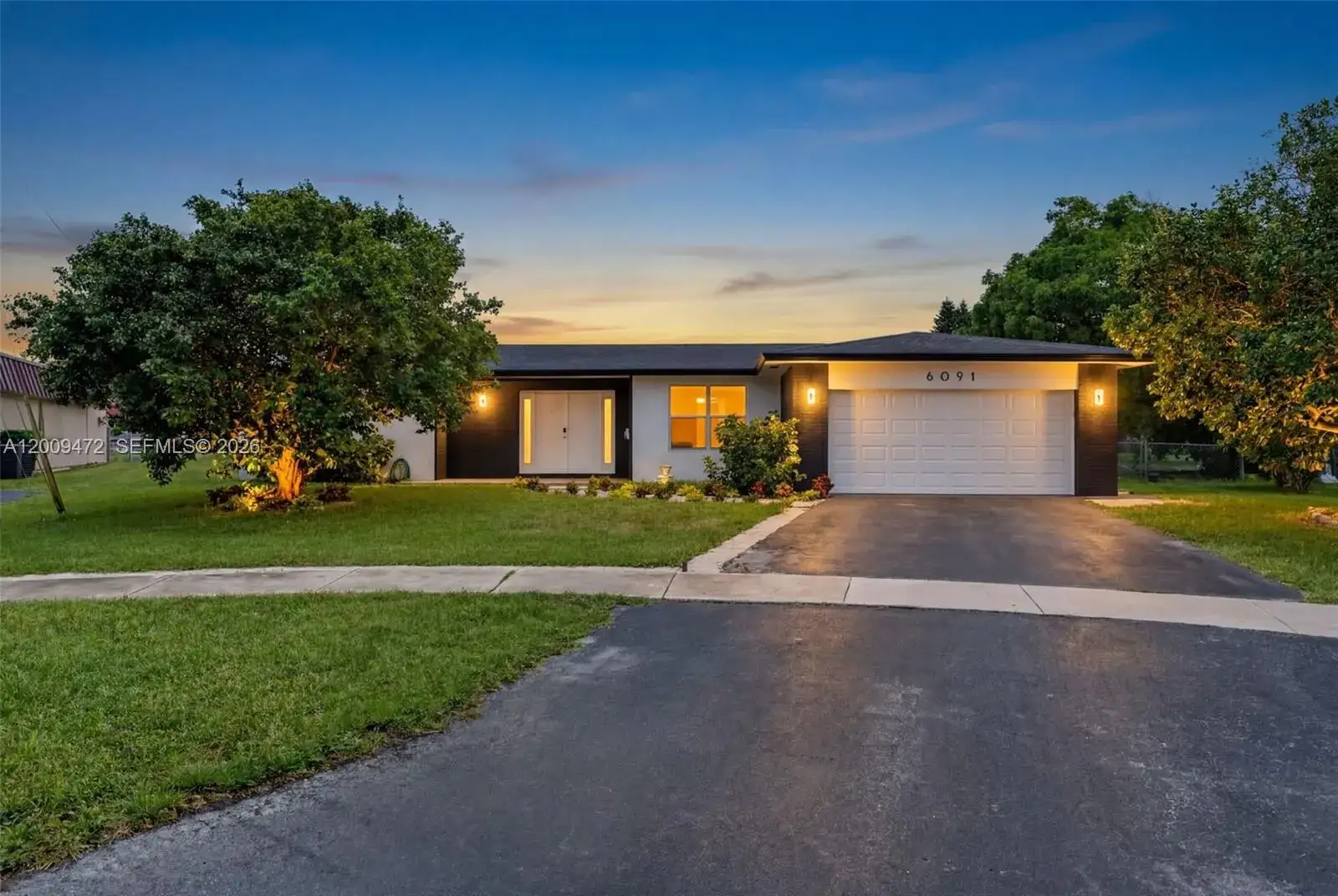 4 bedroom 3 bath Residential for sale at 6091 SW 14th St, Plantation FL 33317