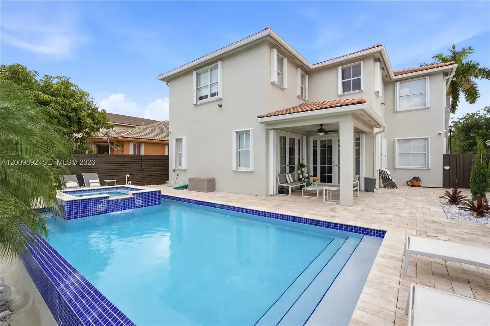 4 bedroom 4 bath Residential for sale at 11090 NW 84th St, Doral FL 33178