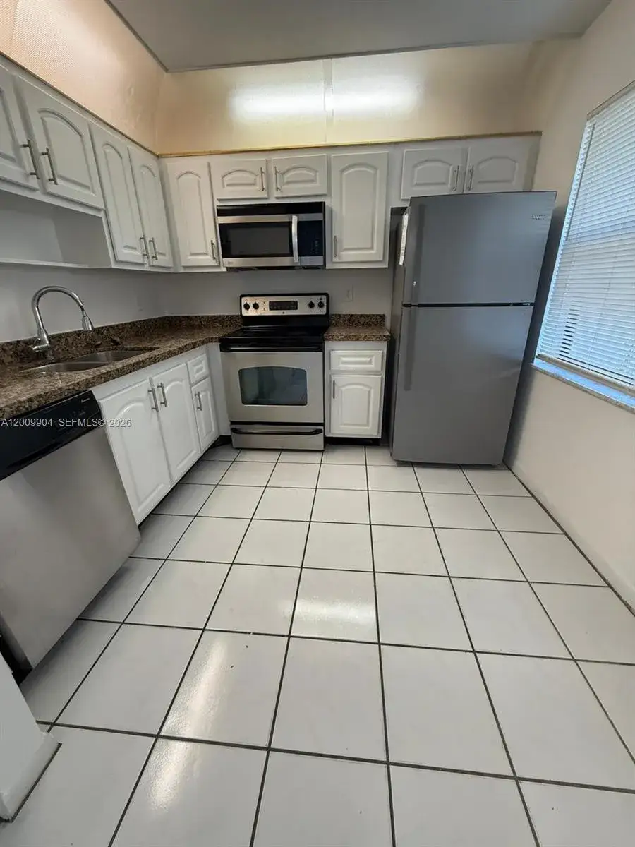 4 bedroom 2 bath Residential for sale at 16413 Grape Way, Delray Beach FL 33484