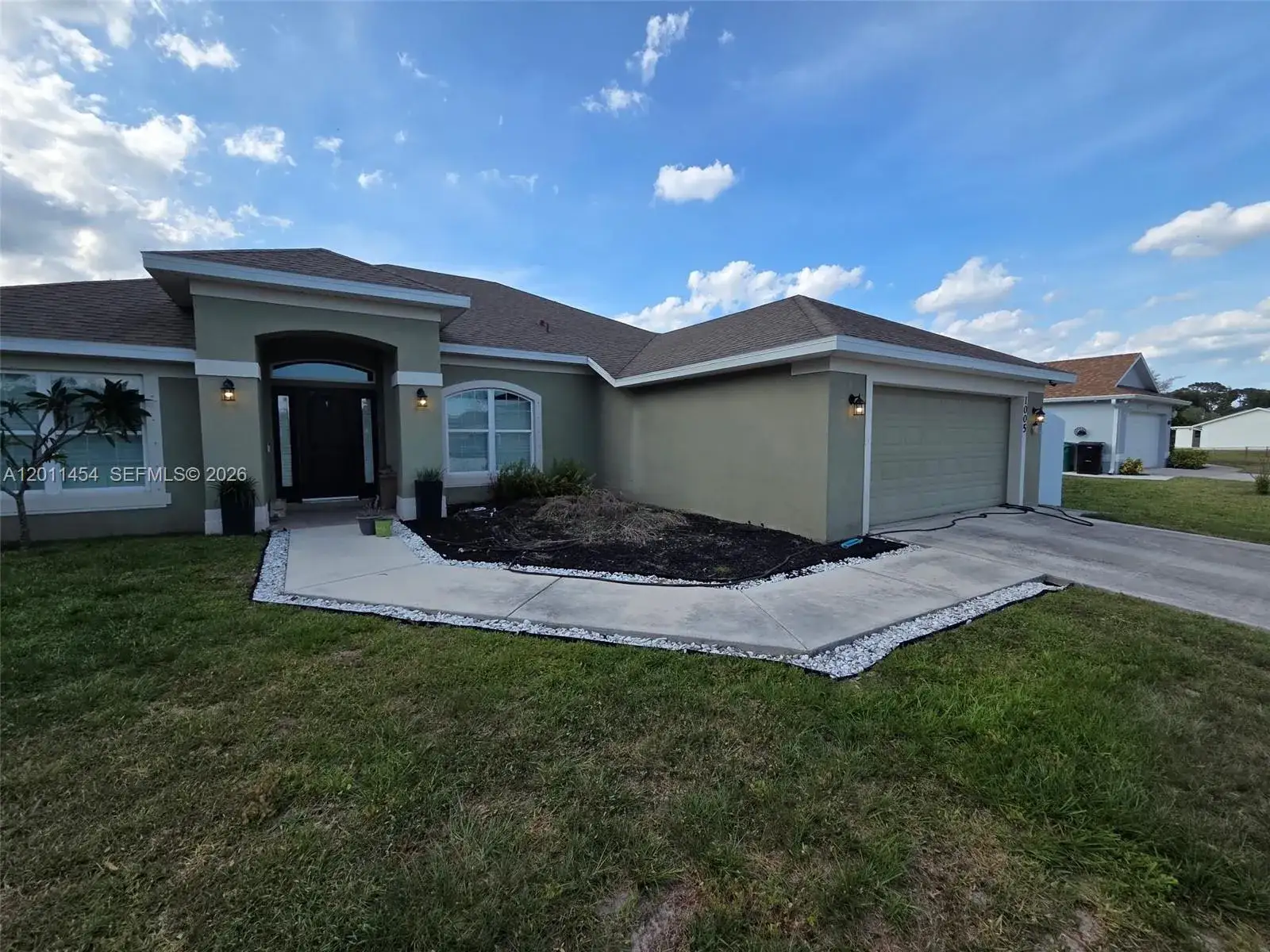 4 bedroom 3 bath Residential for sale at 1005 SW Bay State Rd, Port St. Lucie FL 34953