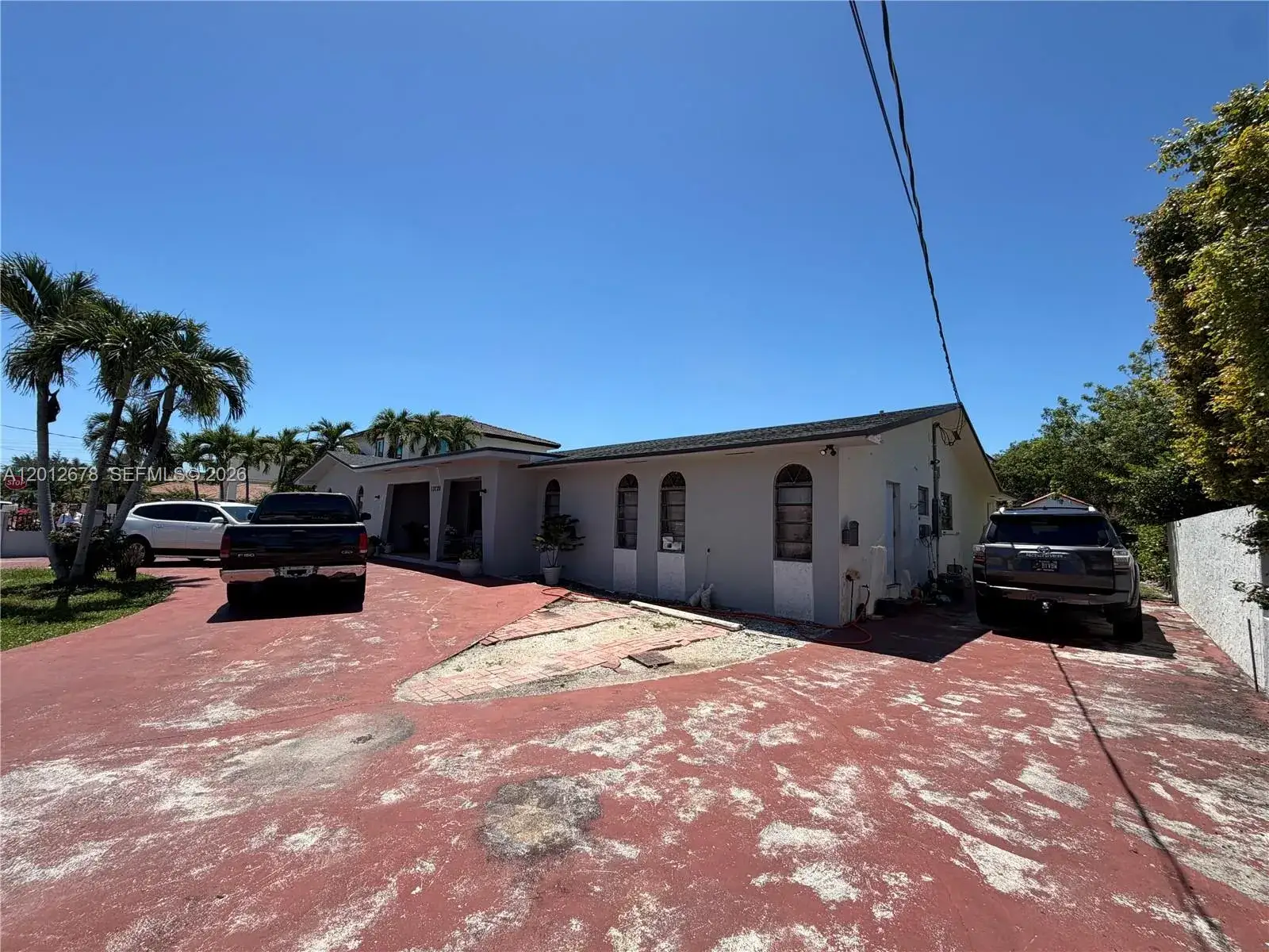 5 bedroom 4 bath Residential for sale at 13720 SW 32nd St, Miami FL 33175