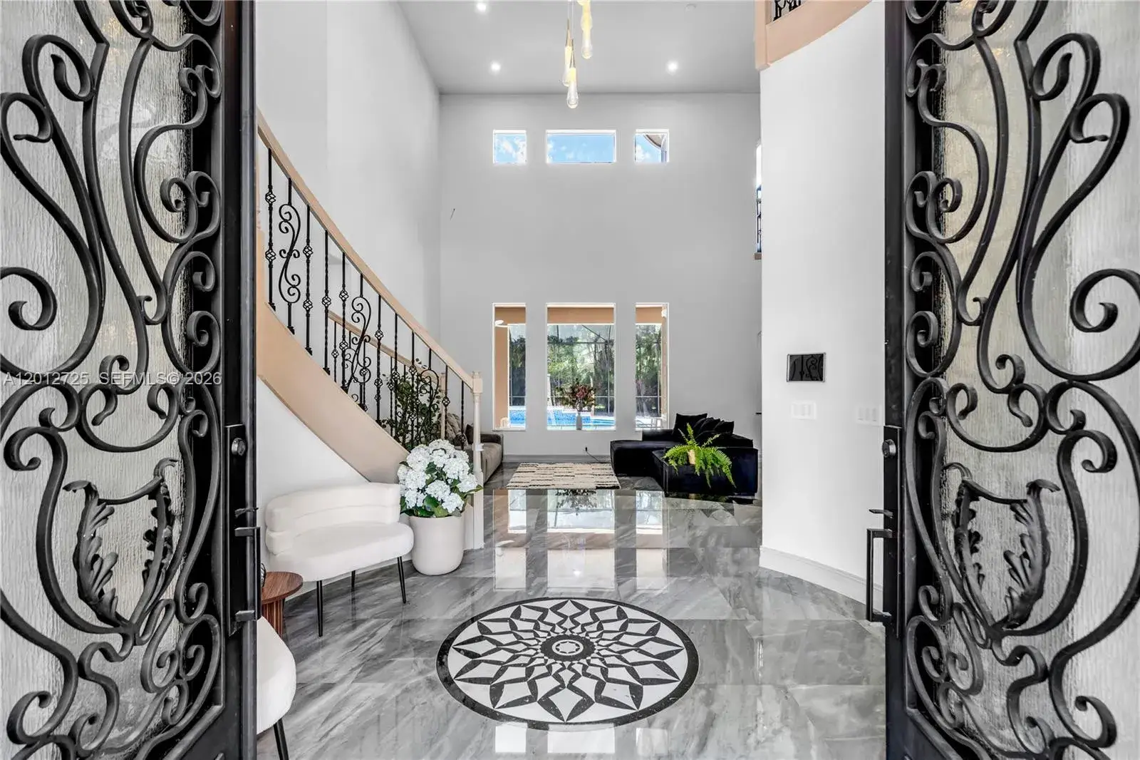 6 bedroom 5 bath Residential for sale at 6803 NW 116th Ave, Parkland FL 33076