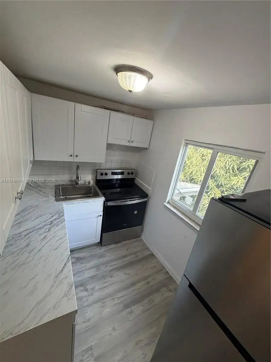 3 bedroom 1 bath Residential Lease for rent at 151 NW 17th Pl # 3, Miami FL 33125