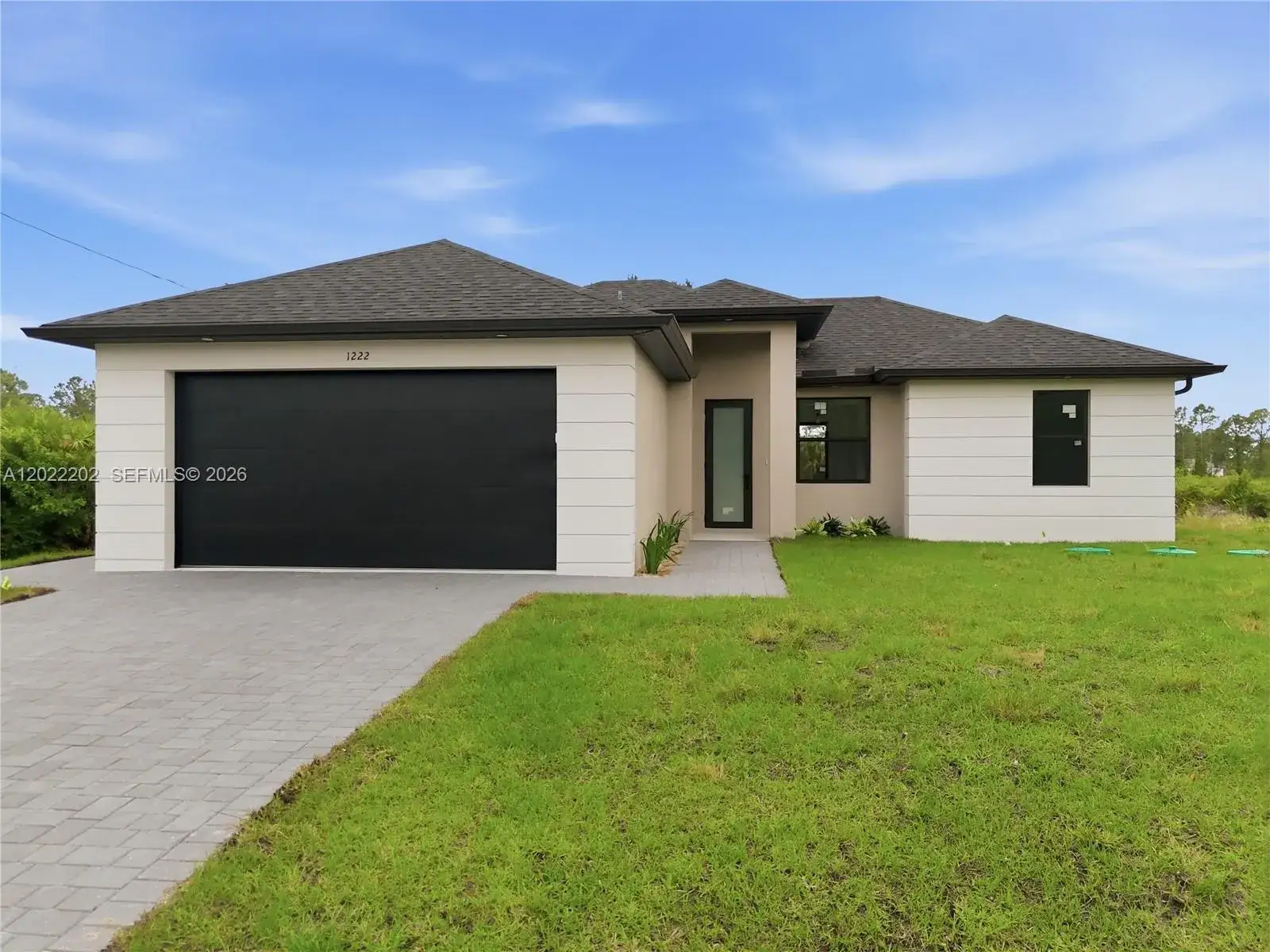 3 bedroom 2 bath Residential for sale at 1222 Earnest St E, Lehigh Acres FL 33974