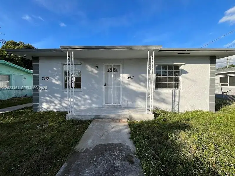 Residential Income for sale at 2411 NW 65th St, Miami FL 33147