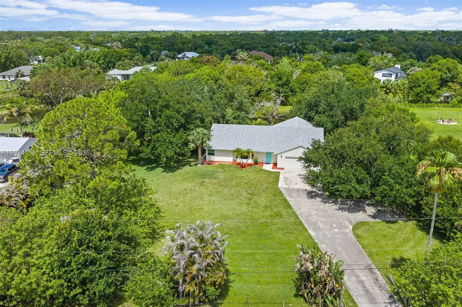 4 bedroom 2 bath Residential for sale at 15305 N 96th St N, Jupiter FL 33478