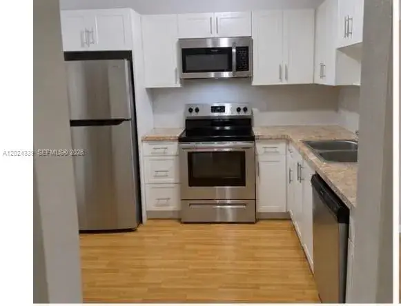 2 bedroom 1 bath Residential Lease for rent at 5401 SW 77th Ct # 202E, Miami FL 33155