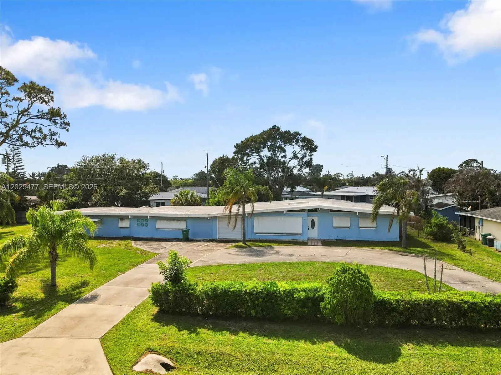 5 bedroom 3 bath Residential for sale at 310 E Olive Ave, Port St. Lucie FL 34952