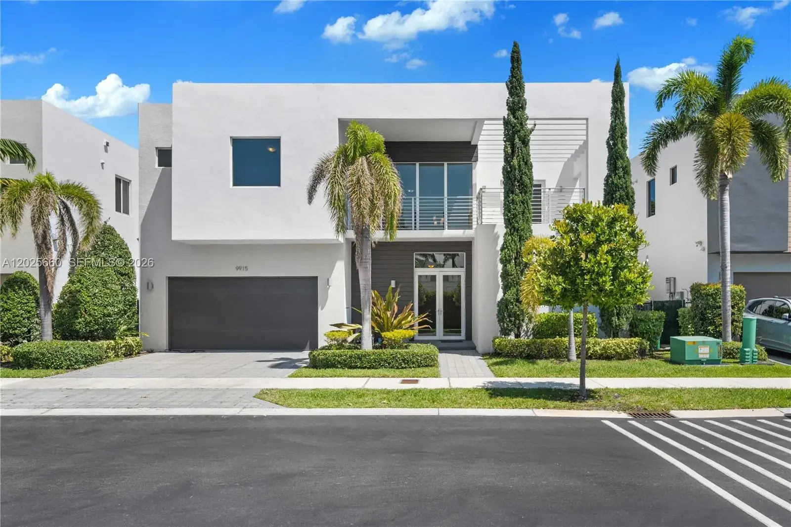 4 bedroom 4 bath Residential for sale at 9915 NW 75th St, Doral FL 33178