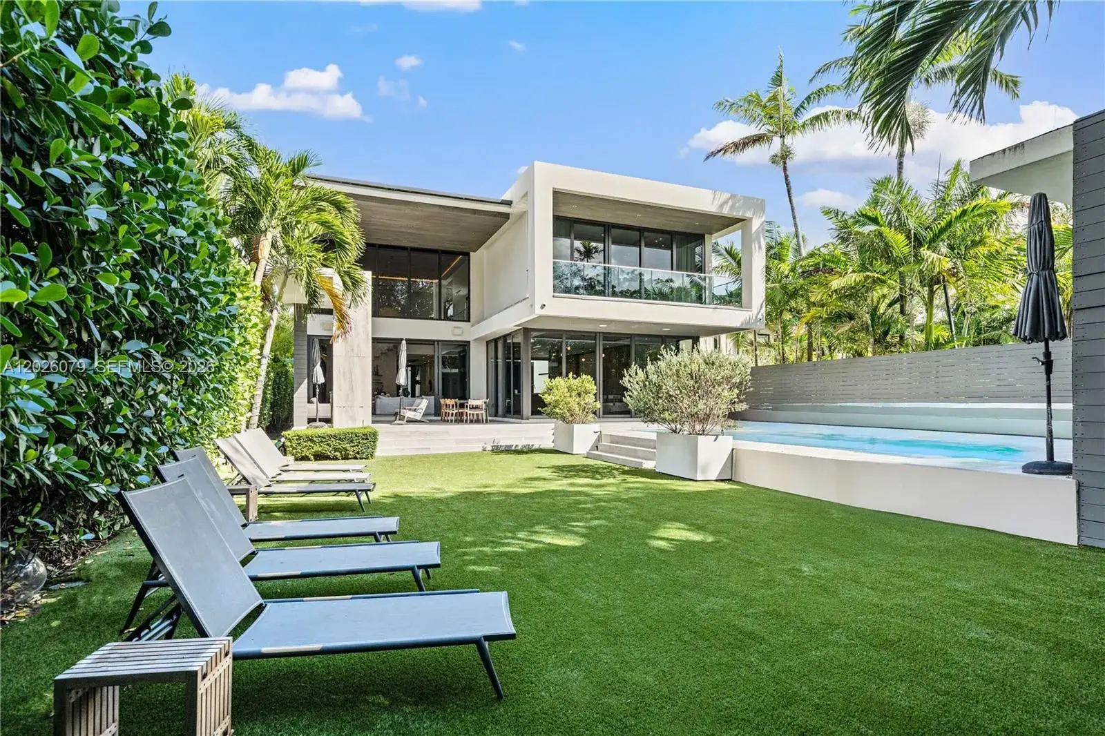 8 bedroom 7 bath Residential Lease for rent at 5061 N Bay Rd, Miami Beach FL 33140