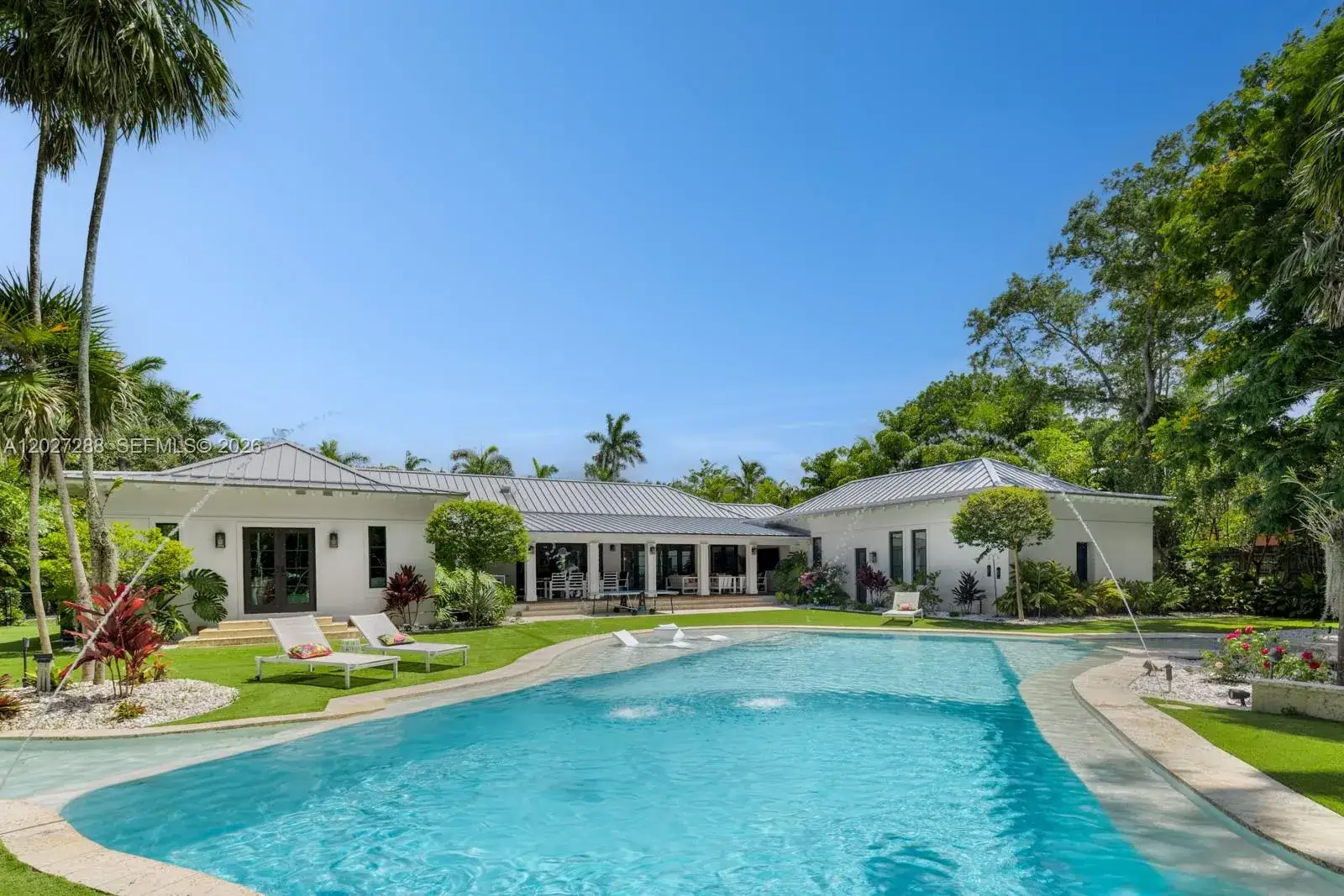 7 bedroom 6 bath Residential for sale at 7101 SW 66th St, Miami FL 33143