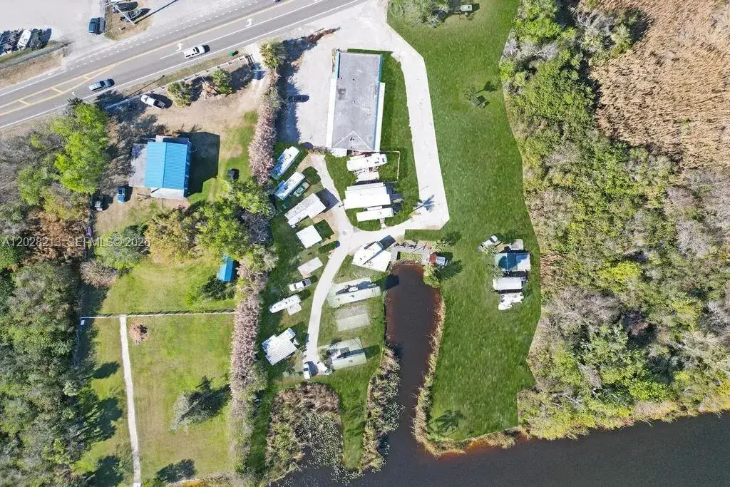 Residential Income for sale at 1422 US Highway 441, Okeechobee FL 34974