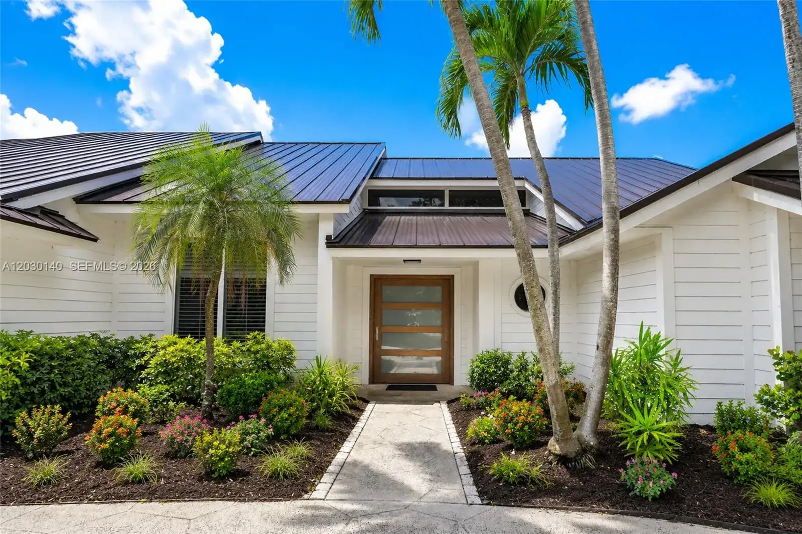 4 bedroom 2 bath Residential for sale at 10290 SE Banyan Way, Jupiter FL 33469