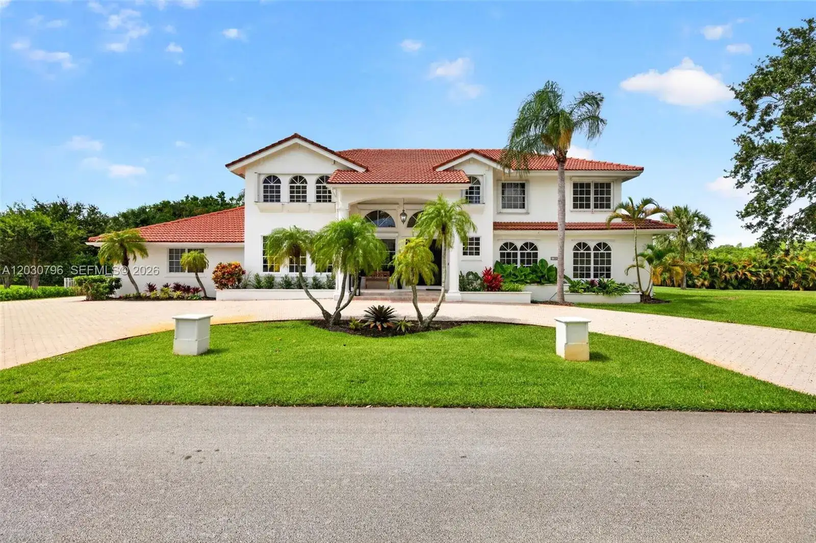 6 bedroom 5 bath Residential for sale at 12360 SW 1st St, Plantation FL 33325
