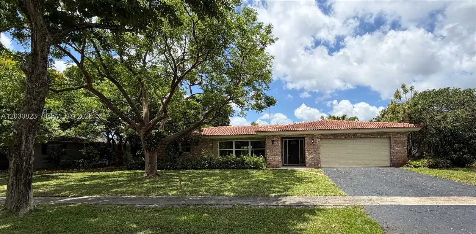 4 bedroom 2 bath Residential for sale at 7220 NW 7th St, Plantation FL 33317