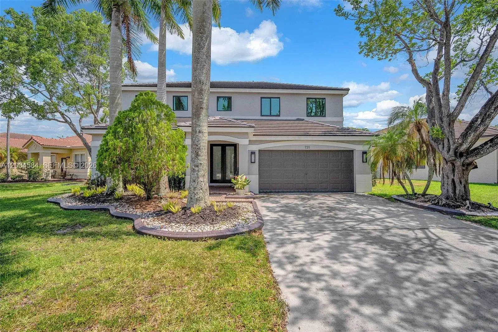 4 bedroom 2 bath Residential for sale at 731 Tulip Cir, Weston FL 33327