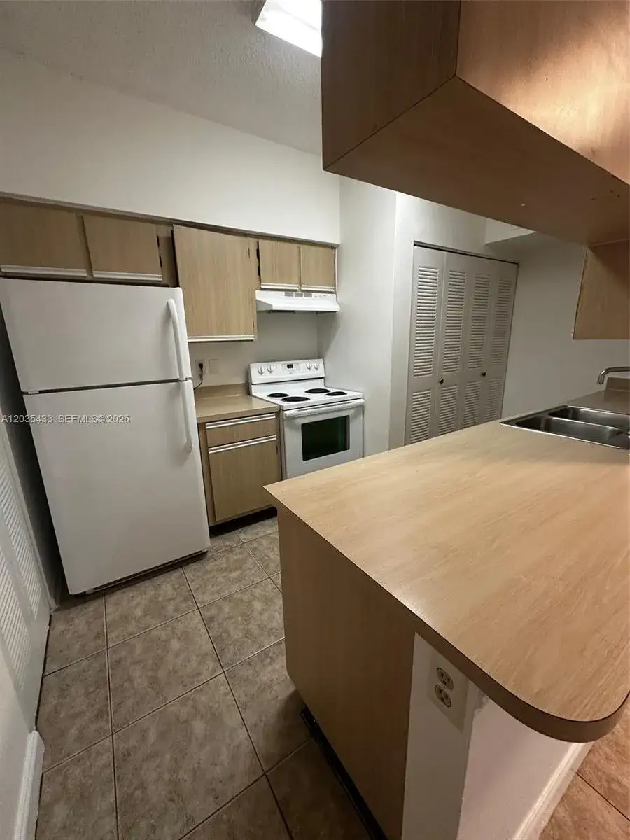 1 bedroom 1 bath Residential for sale at 18356 NW 68th Ave # K, Hialeah FL 33015
