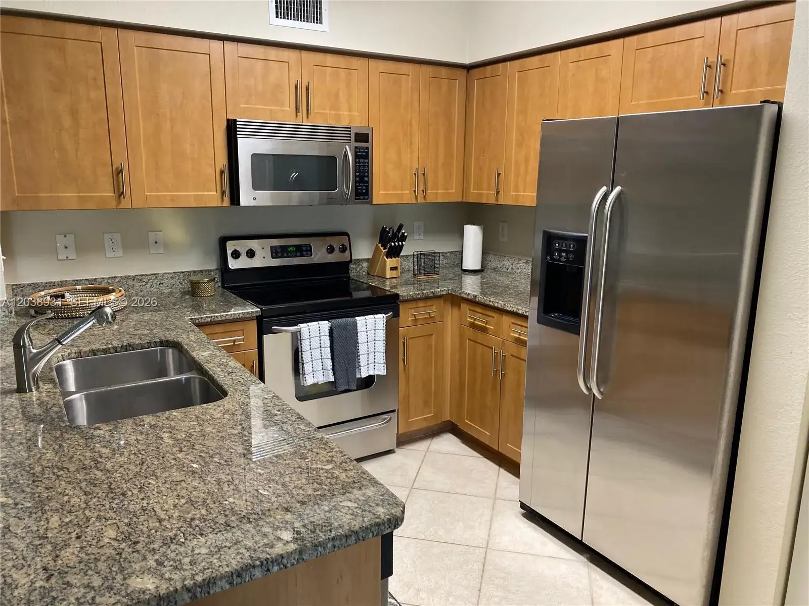 3 bedroom 2 bath Residential for sale at 6400 Emerald Dunes Dr #303, West Palm Beach FL 33411