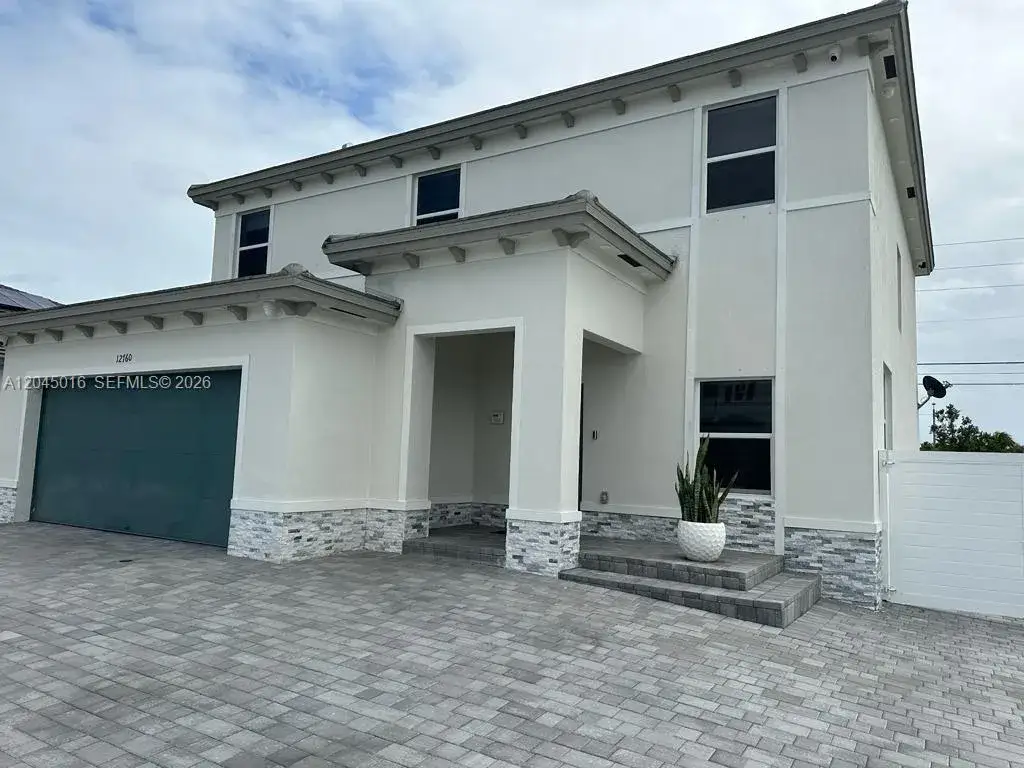 5 bedroom 3 bath Residential Lease for rent at 12760 SW 215th Ter, Miami FL 33177
