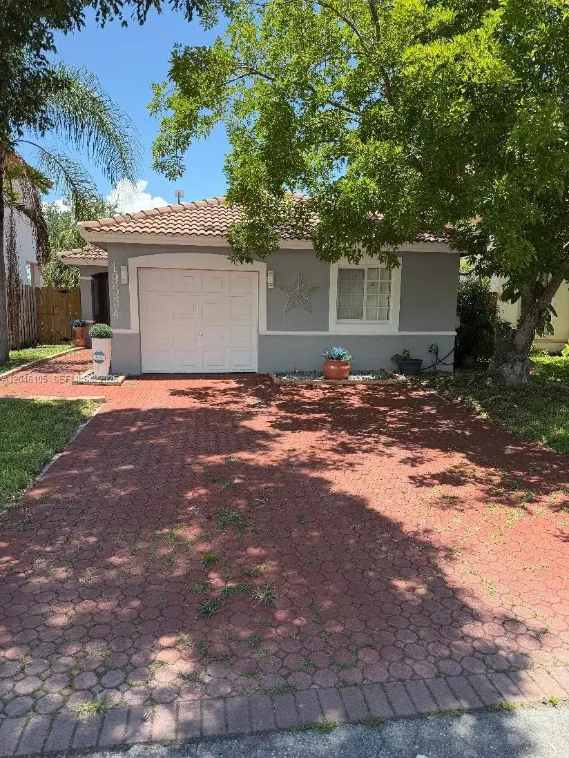 3 bedroom 2 bath Residential for sale at 19554 NW 79th Pl, Hialeah FL 33015