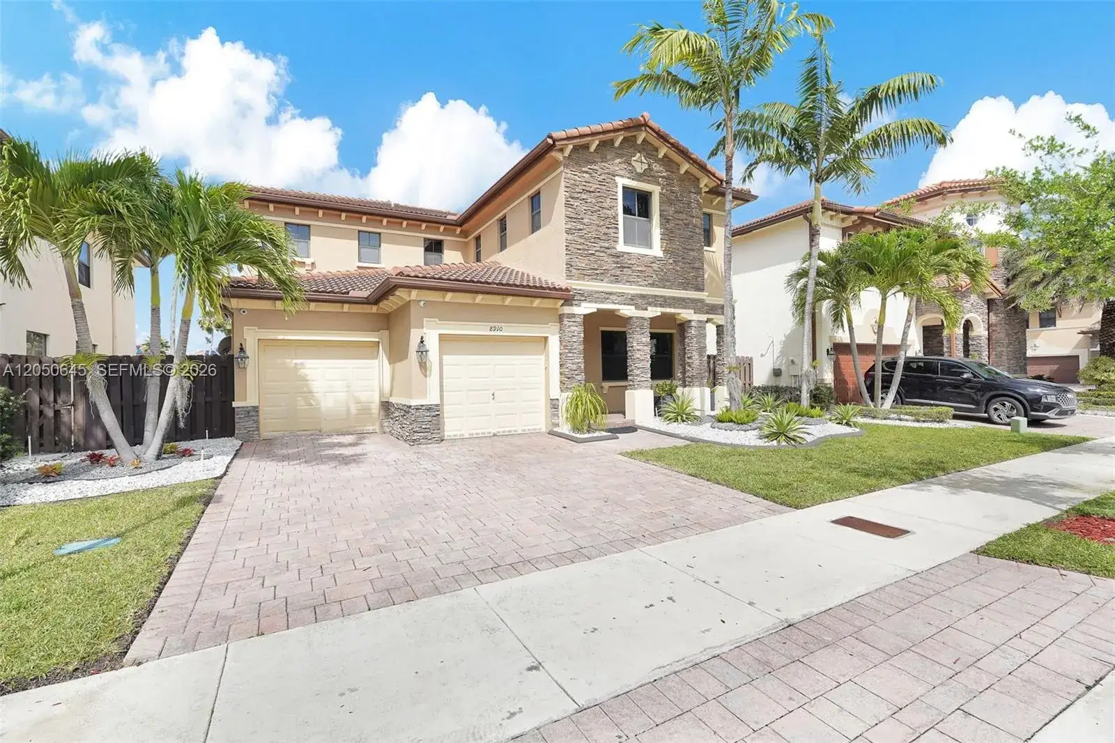 4 bedroom 4 bath Residential for sale at 8910 NW 98th Ct, Doral FL 33178
