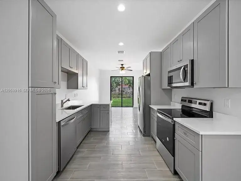 5 bedroom 2 bath Residential for sale at 141 W 16th St, Riviera Beach FL 33404