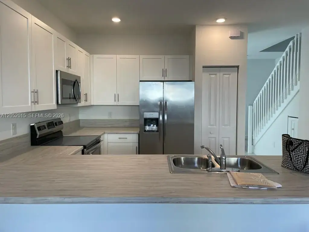 3 bedroom 2 bath Residential Lease for rent at 825 NE 211th St # 825, Miami FL 33179