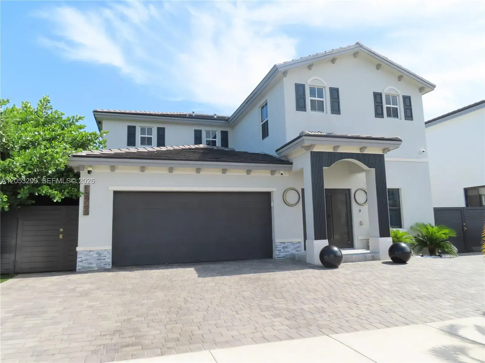 5 bedroom 4 bath Residential for sale at 12765 SW 210th Ter, Miami FL 33177