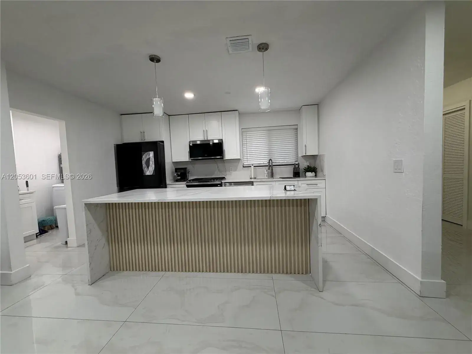5 bedroom 3 bath Residential for sale at 4700 NW 1st Ct, Plantation FL 33317