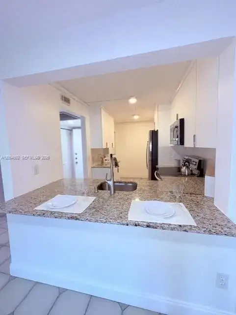 2 bedroom 2 bath Residential Lease for rent at 871 NE 207th Ter # 102, Miami FL 33179