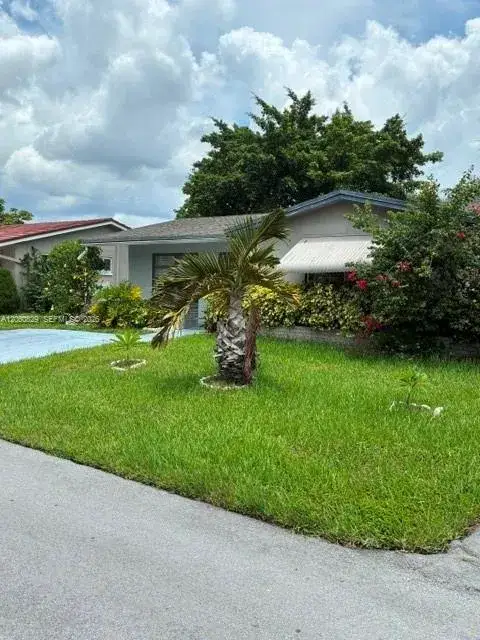 2 bedroom 1 bath Residential for sale at 7311 NW 57th Dr, Tamarac FL 33321