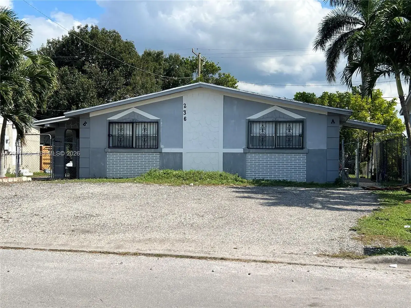 Residential Income for sale at 236 NW 9th Ave, South Bay FL 33493