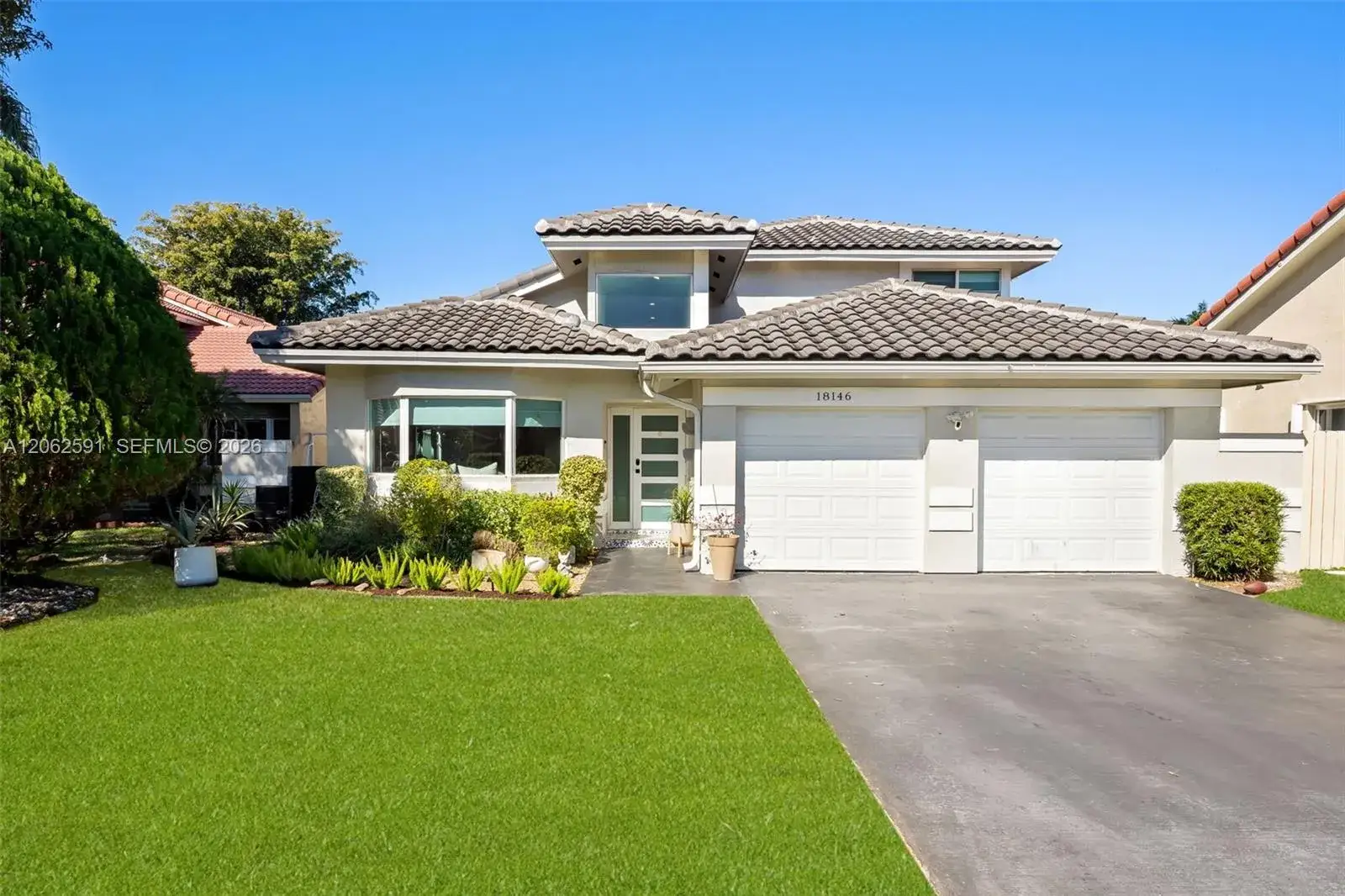 4 bedroom 2 bath Residential for sale at 18146 NW 61st Pl, Hialeah FL 33015