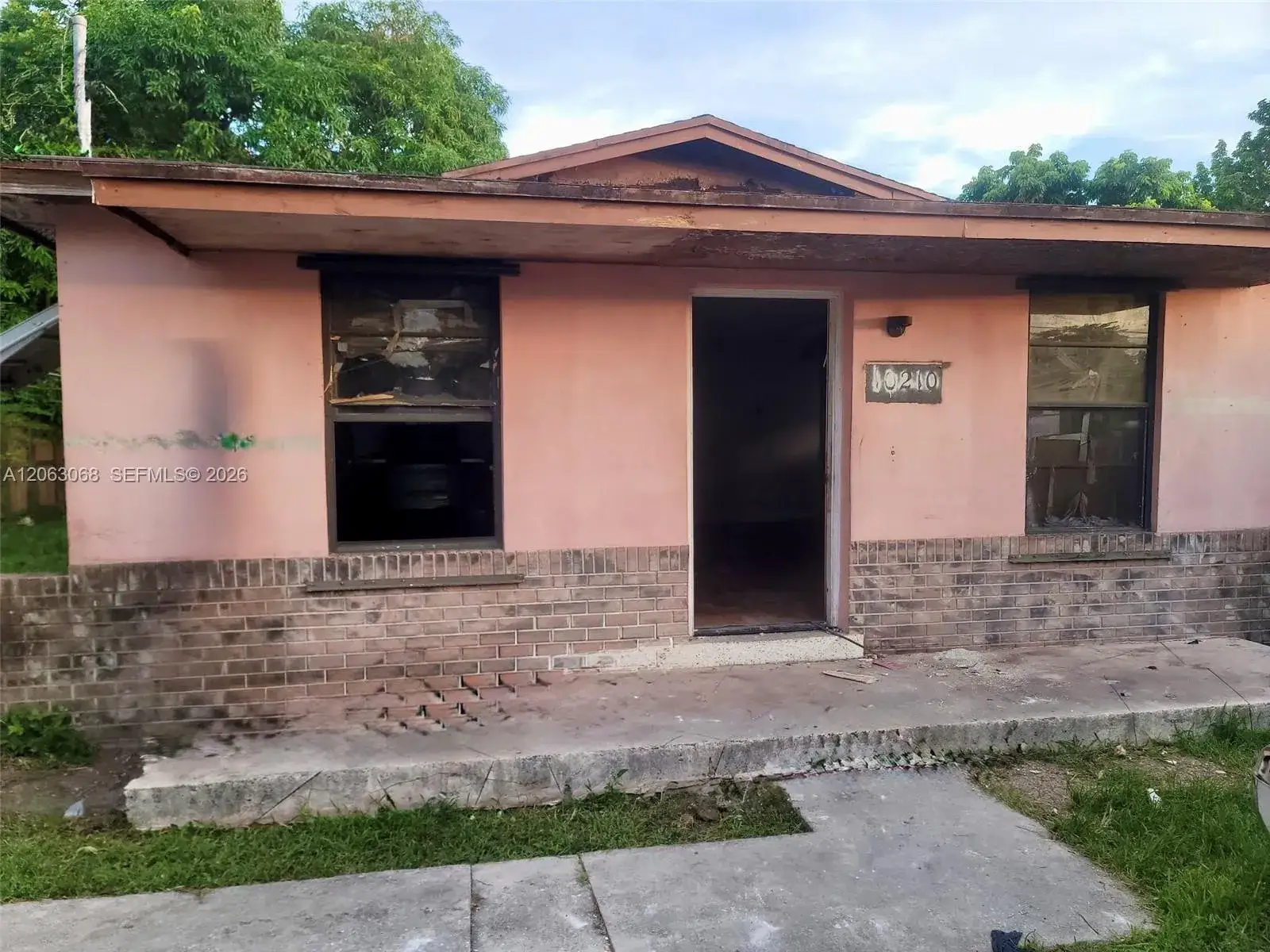 4 bedroom 2 bath Residential for sale at 10210 SW 173rd St, Miami FL 33157