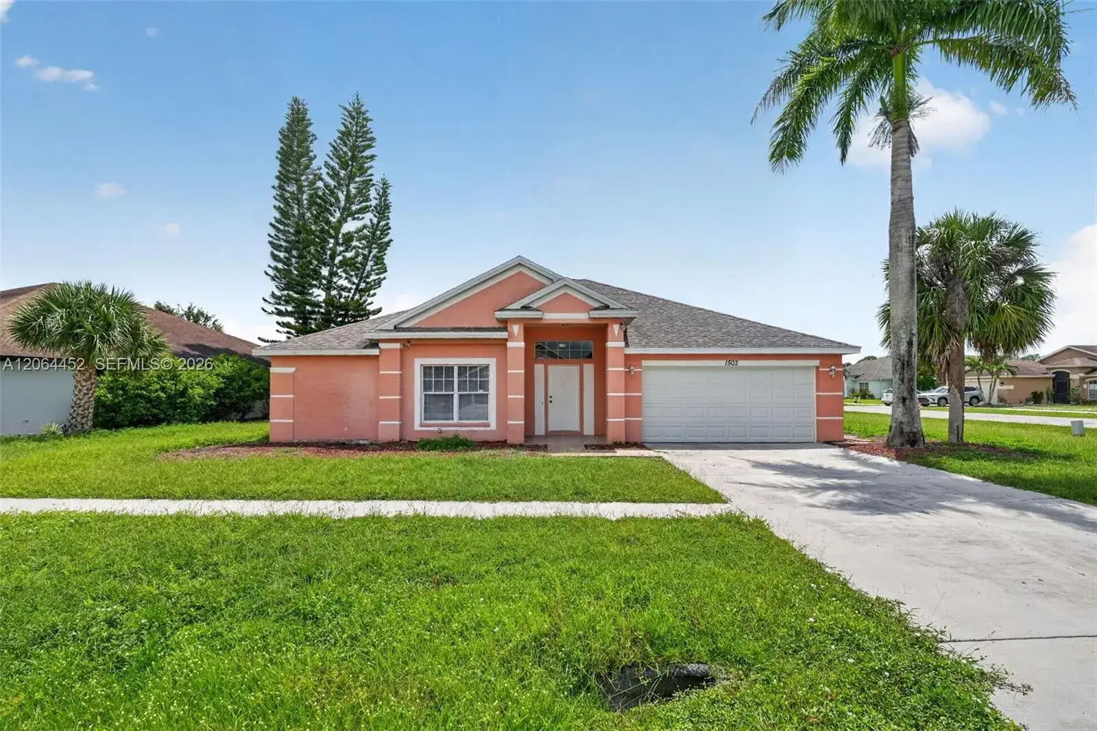 3 bedroom 2 bath Residential for sale at 1502 Scholar CT, Lehigh Acres FL 33971