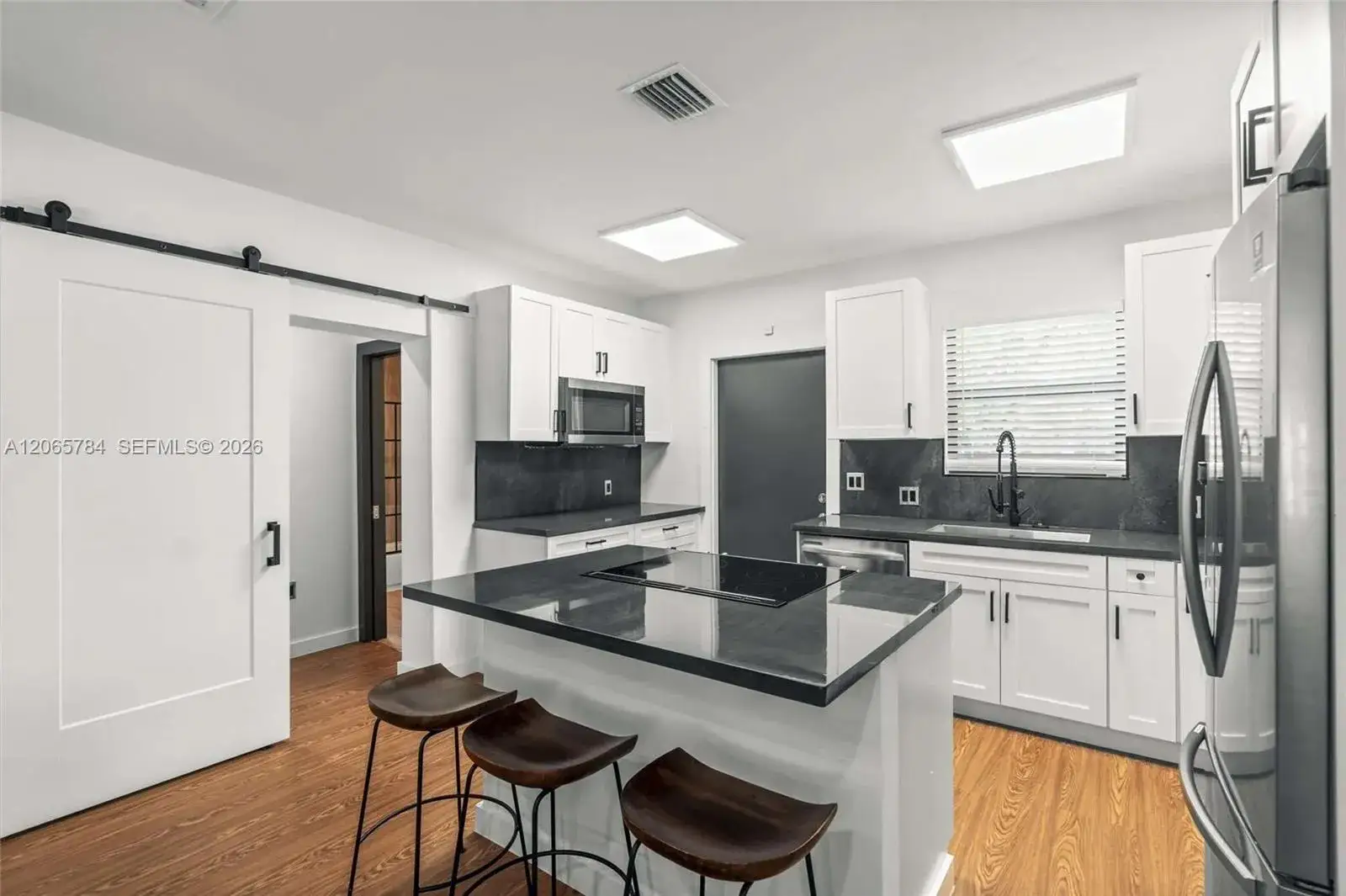 3 bedroom 2 bath Residential for sale at 1121 NW 57th St, Miami FL 33127